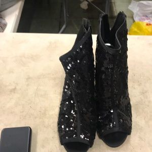 Black open toe heeled boots